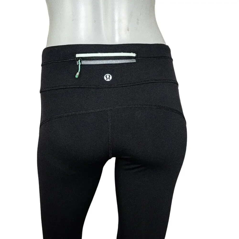 Lululemon two tone Green Black Leggings mesh side size 4